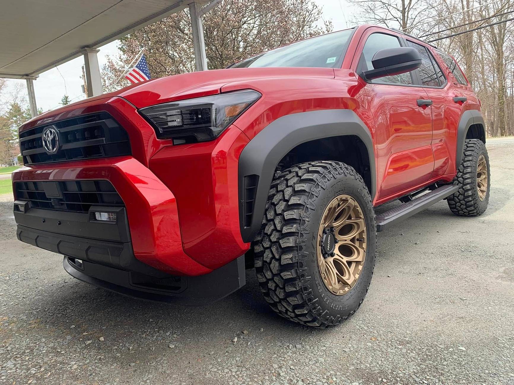 2025 Toyota 4runner SUPERSONIC RED Photos 4Runner 6th Gen (2025+) Supersonic Red SR5 on -12 offset wheels and Cooper Evolution M:T tires 1