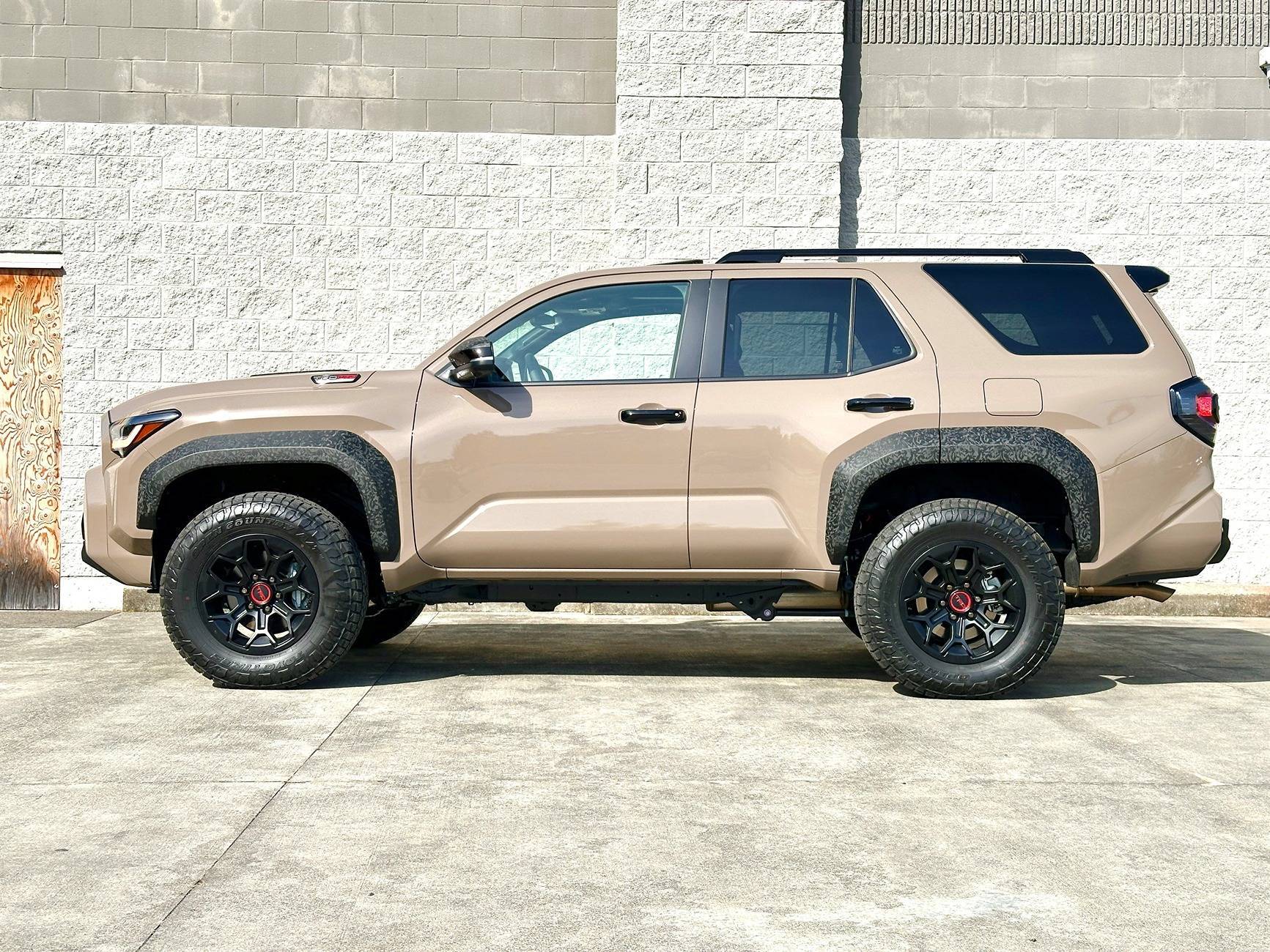 2025 Toyota 4runner TRD Pro: Wrapped black flares, mirror caps, hood scoop in 3M 2080 Shadow Black Textured Vinyl Wrap muddy_side_view-