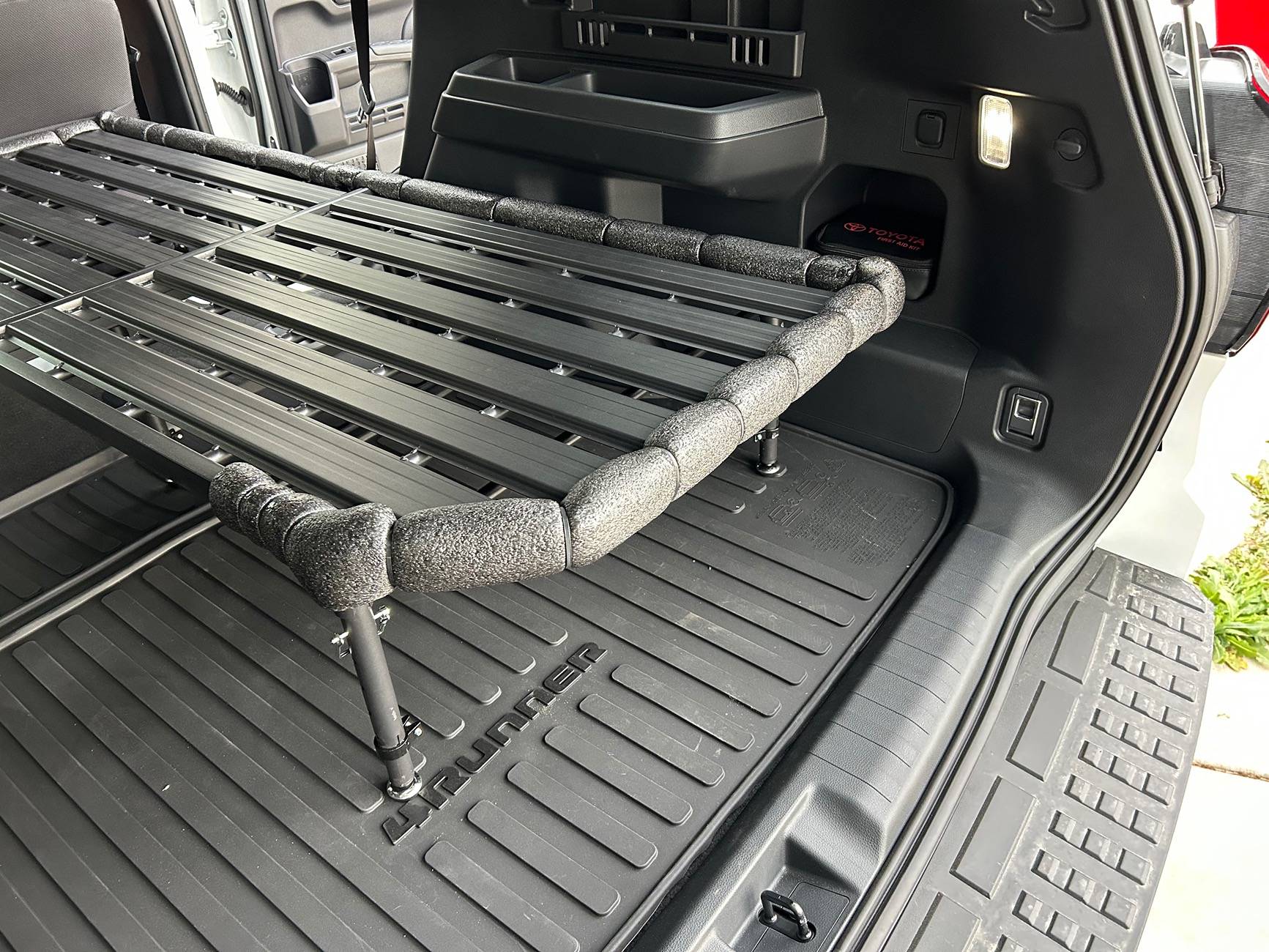 2025 4runner 6th gen Camping / sleeping bed in cargo area with Nokhu Gear Pack Rack platform & mattress IMG_4159