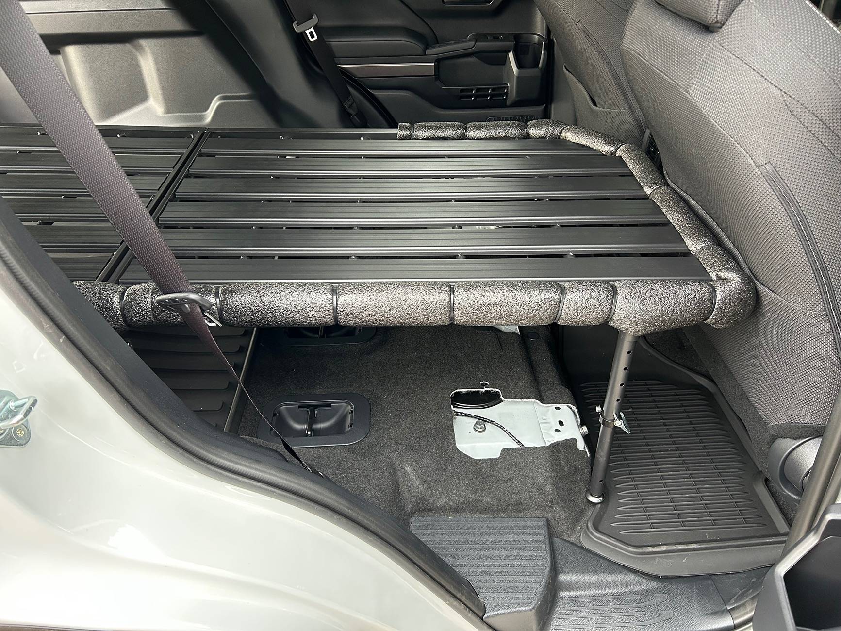 2025 4runner 6th gen Camping / sleeping bed in cargo area with Nokhu Gear Pack Rack platform & mattress IMG_4160