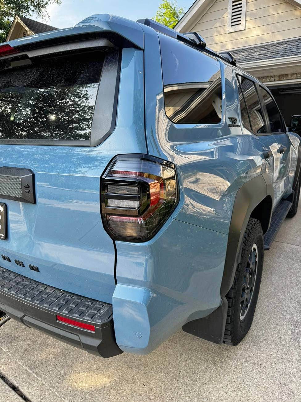 2025 4runner 6th gen Premium Tail Lights Installed on Heritage Blue ORP IMG_9056