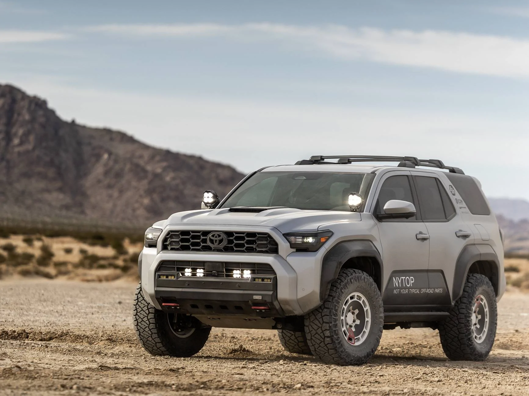 2025 4runner 6th gen NYTOP 2025 4Runner 6th Gen Build Render: White Wheels, Carbon Fenders, Front Bumper, Rear Recovery Hooks BAJADESIGNS_NYTOP-7467-2
