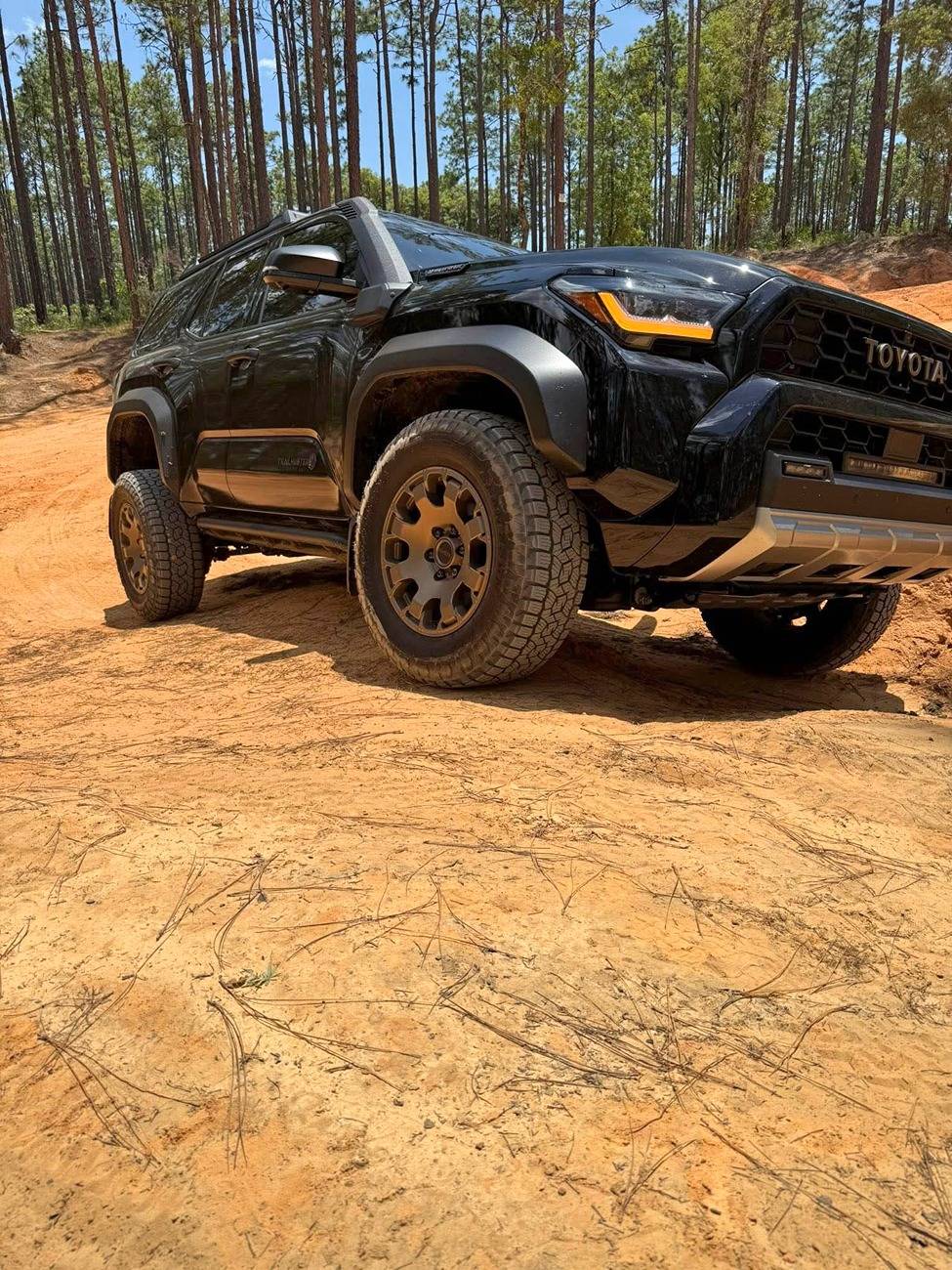 2025 4runner 6th gen Trailhunter PHOTOS doing 4runner things! (any colors welcome!) Black Trailhunter 4Runner offroading crawling 1