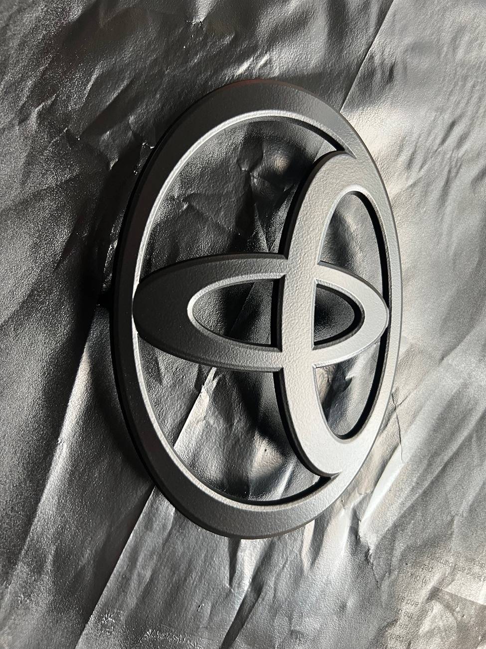 2025 4runner 6th gen Black Toyota front badge via Plastidip IMG_3572