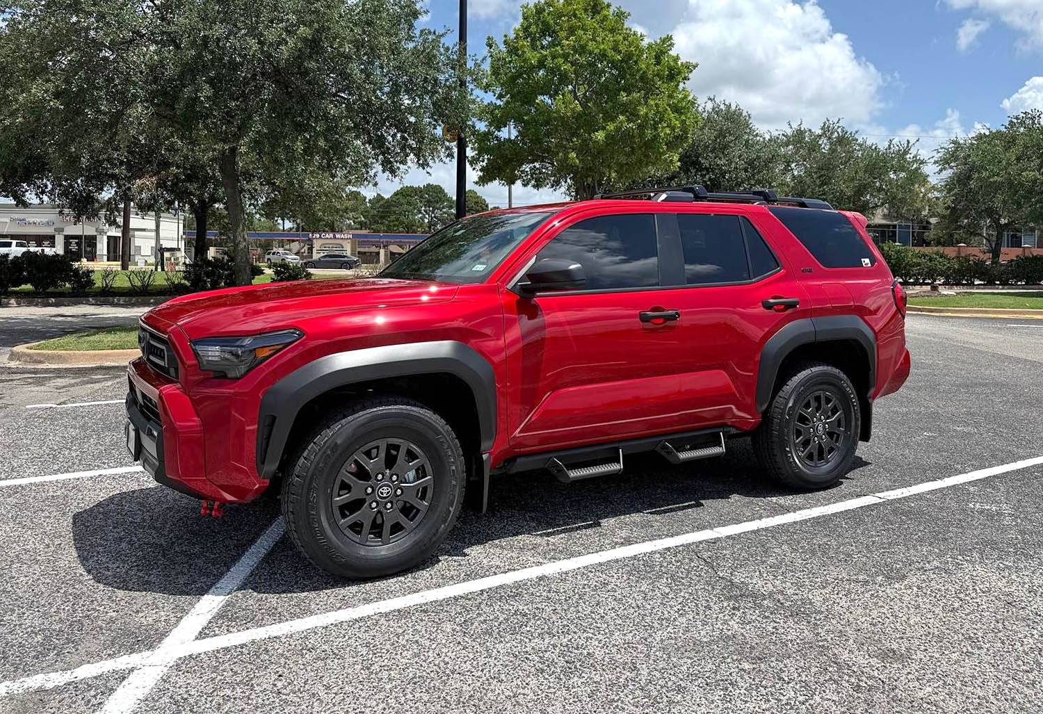 2025 4runner 6th gen First month mods: Bridgestone Dueler A/T RH-S All Terrain 255/75R17 115T, red seat covers and red shackles IMG_8705