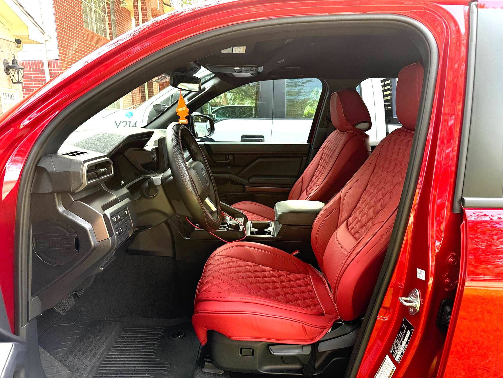 2025 4runner 6th gen First month mods: Bridgestone Dueler A/T RH-S All Terrain 255/75R17 115T, red seat covers and red shackles IMG_8663