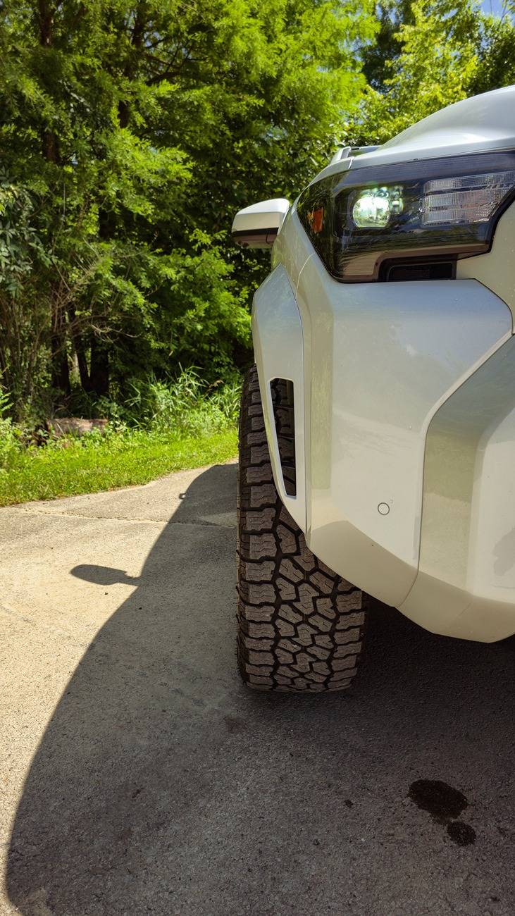 2025 4runner 6th gen 1.5" KSP wheel spacers installed + 275/60/20 Falken Wildpeak A/T4W on stock TRD Sport wheels. 20250619_144803