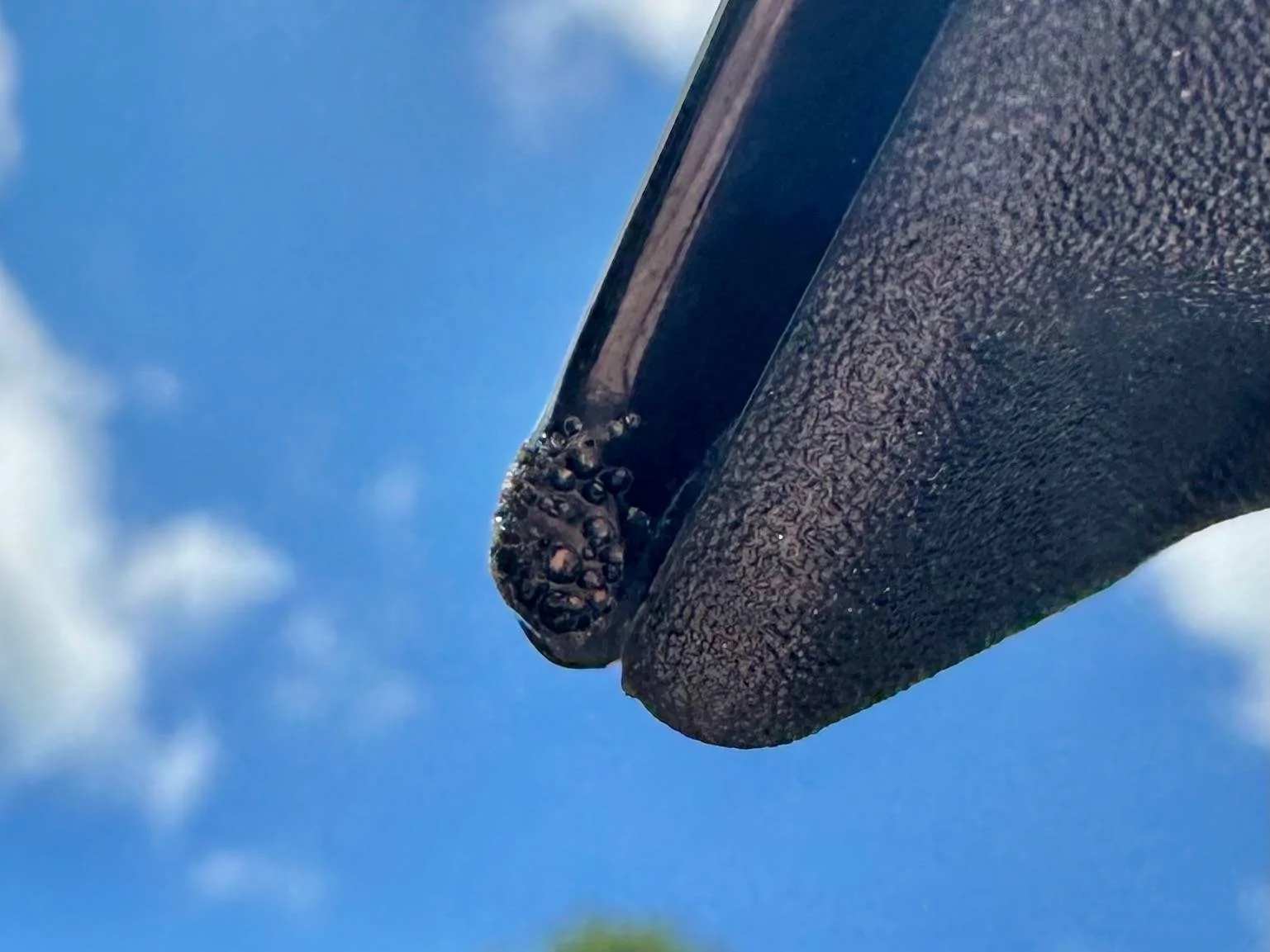 2025 4runner 6th gen Paint Defect - Bubbles on corner of liftgate IMG_0137