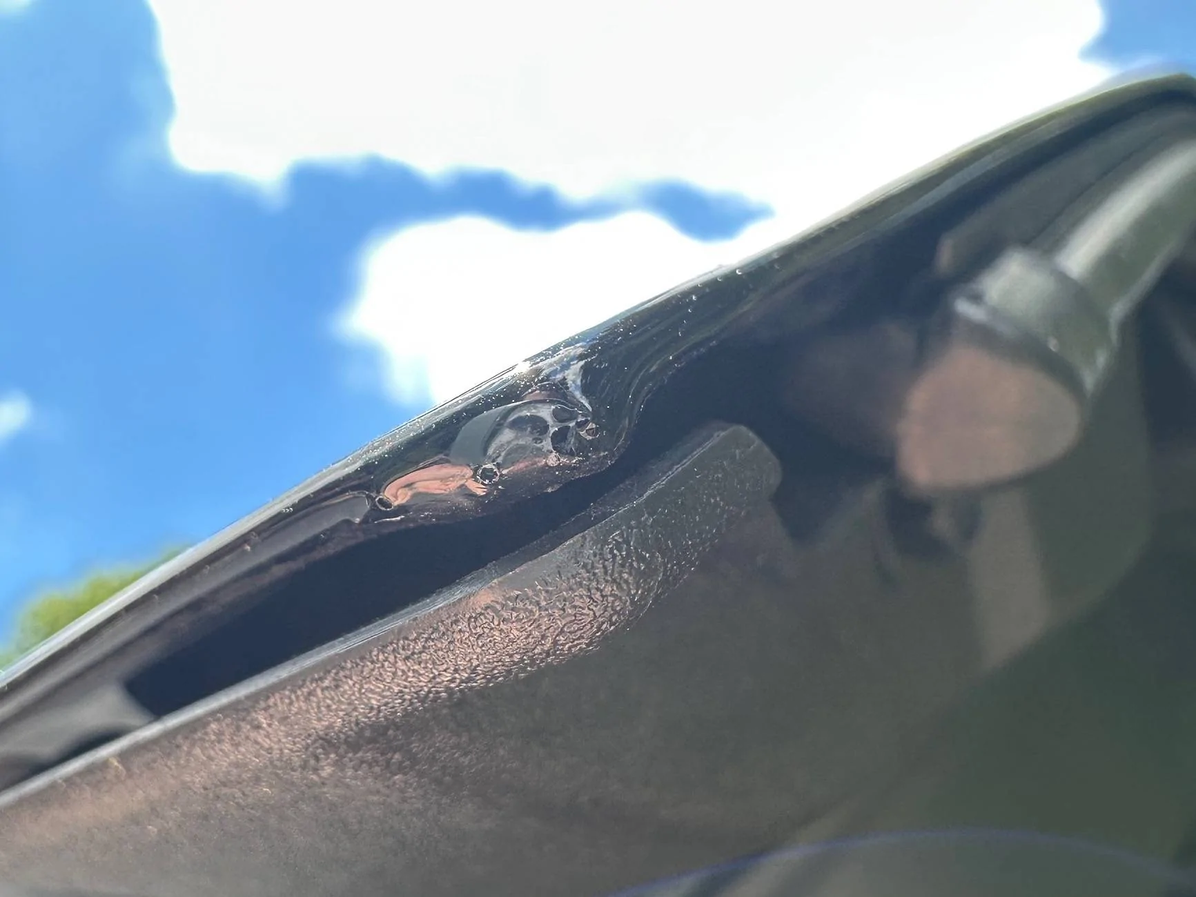 2025 4runner 6th gen Paint Defect - Bubbles on corner of liftgate IMG_0138