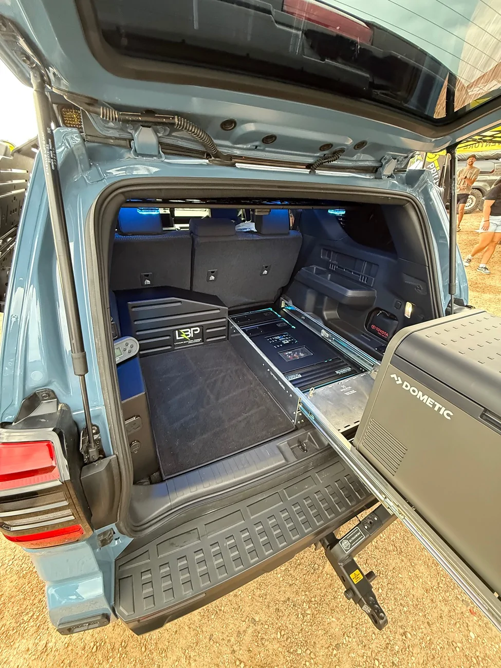 2025 4runner 6th gen RIGd ultra swing tire carrier (35" tire installed) w/ table IMG_9475