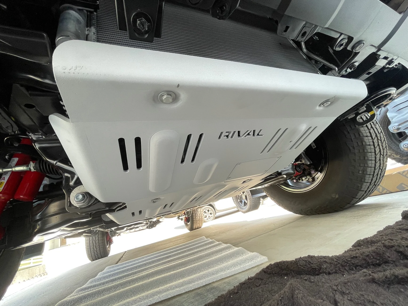 2025 4runner 6th gen Rival 4x4 Lower control arms (LCA) skid plates, transfer case skid plate, and transmission skid plate now installed IMG_2909