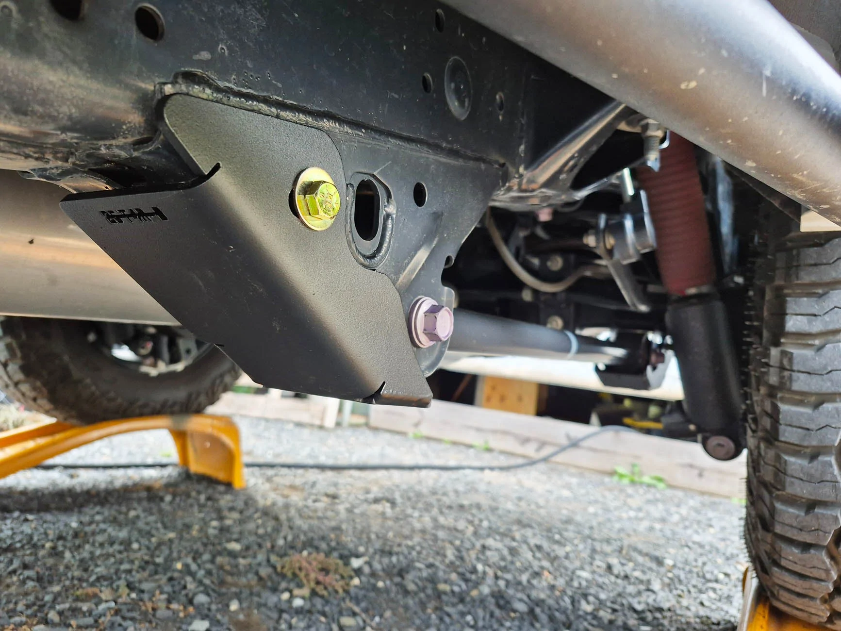 2025 4runner 6th gen OEM differential skid plate, RCI Front and Rear lower control link skids, LCA skids and rear shock skids installed OEM differential skid plate and REI (Rear) Front and Rear lower control link skids 2