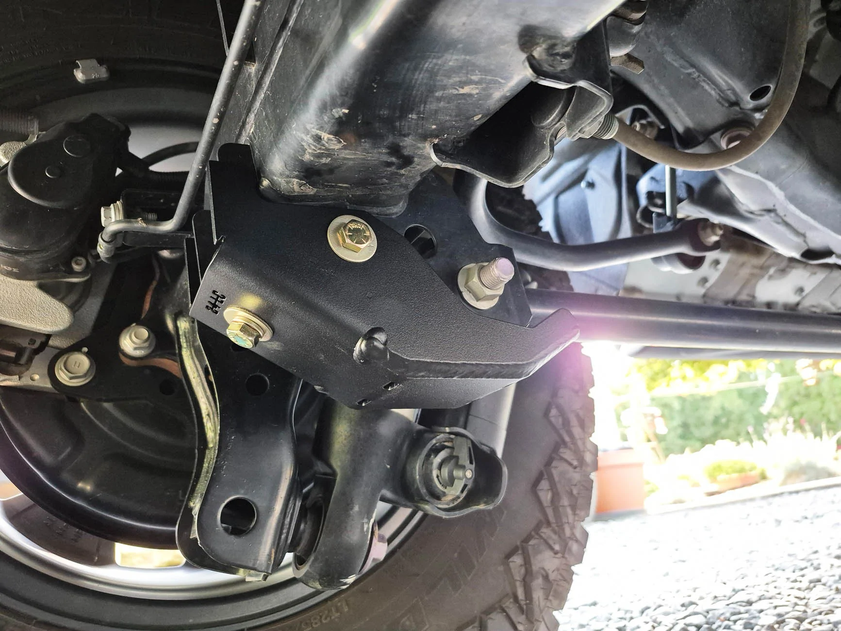 2025 4runner 6th gen OEM differential skid plate, RCI Front and Rear lower control link skids, LCA skids and rear shock skids installed OEM differential skid plate and REI (Rear) Front and Rear lower control link skids 3