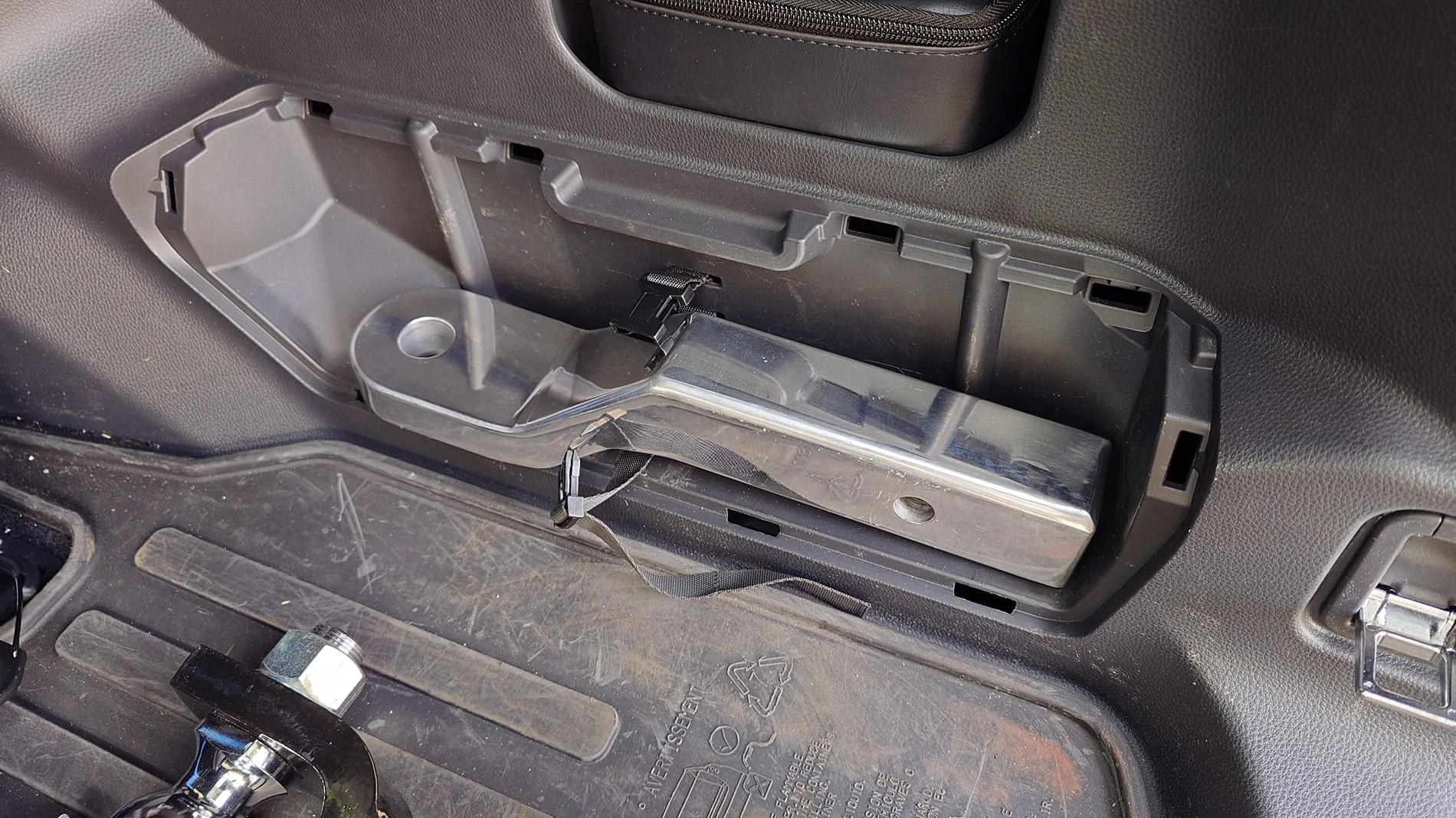 2025 4runner 6th gen Relocated the tire iron kit (under the jack) to store a hitch in the tire iron cubby 20250909_084626966