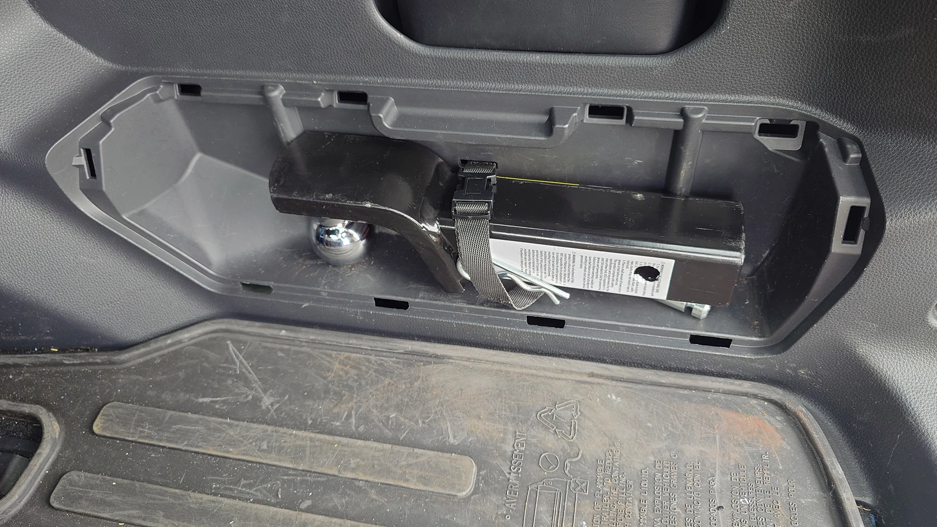 2025 4runner 6th gen Relocated the tire iron kit (under the jack) to store a hitch in the tire iron cubby 20250910_110352896