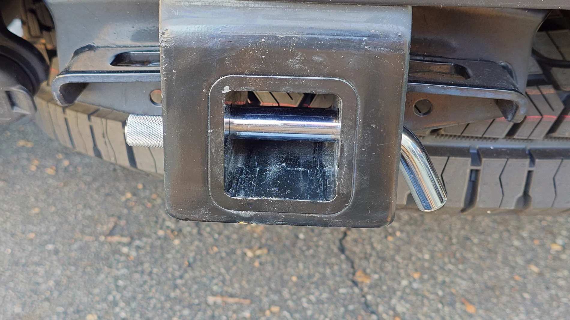 2025 4runner 6th gen Relocated the tire iron kit (under the jack) to store a hitch in the tire iron cubby 20250911_172246441