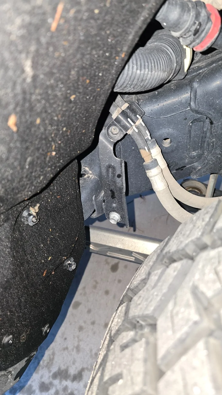 2025 4runner 6th gen What is this thing in the rear drivers side wheel well? 20250926_183546