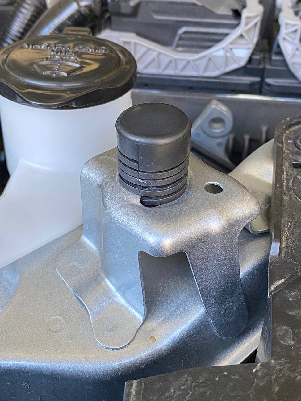 2025 4runner 6th gen Front End clunk solved: adjust the hood stops IMG_1266