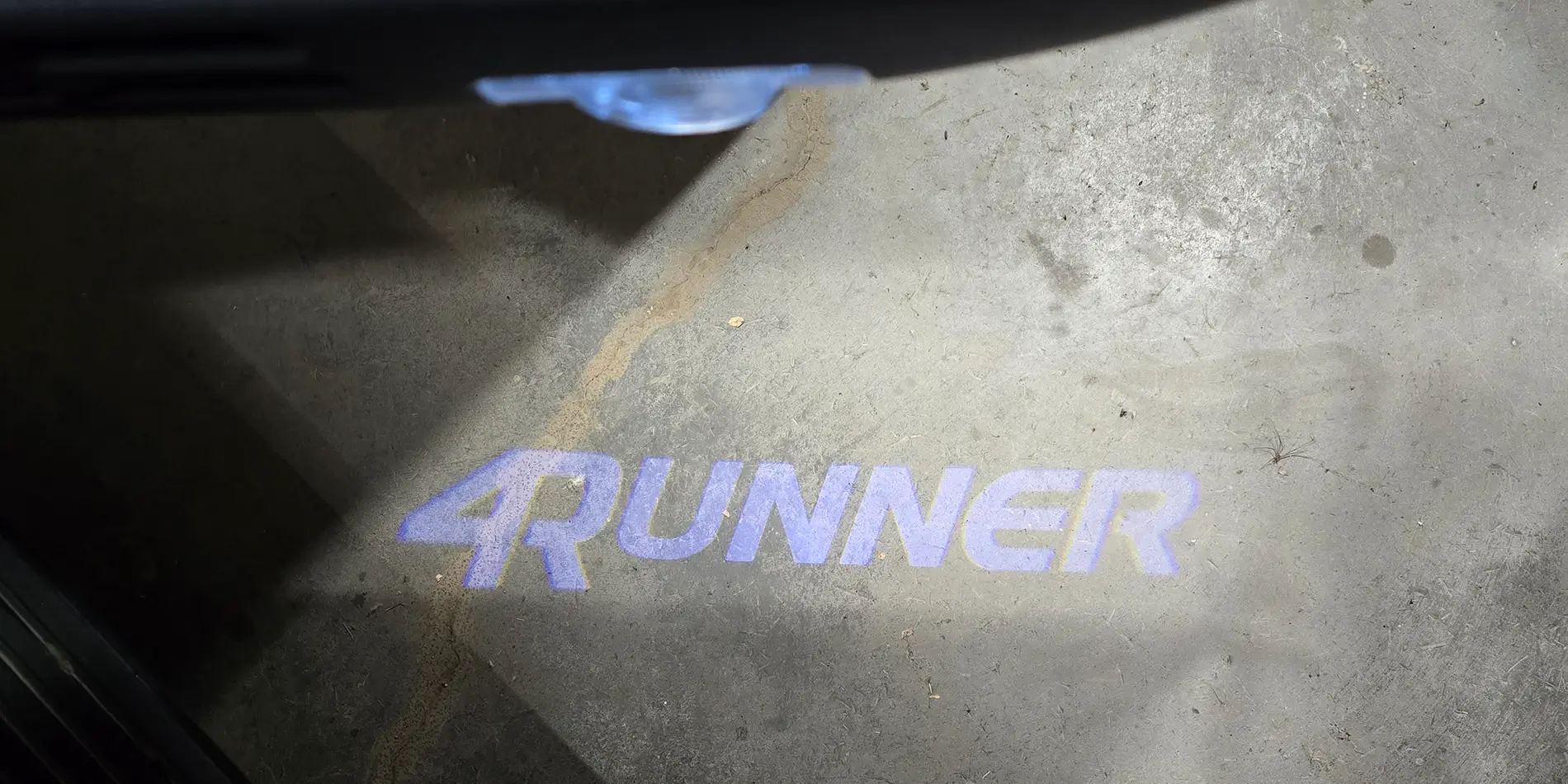 2025 4runner 6th gen Puddle lights installed (Trailhunter projection light) 2025 4Runner Front Door Puddle Lights Bright Resized