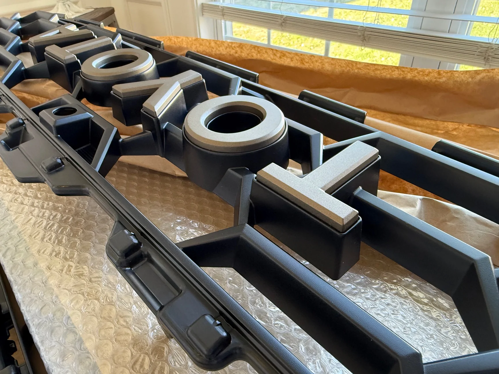 2025 4runner 6th gen Question regarding Heritage Grille lettering removal and emblem part numbers (Blackout project) IMG_0986