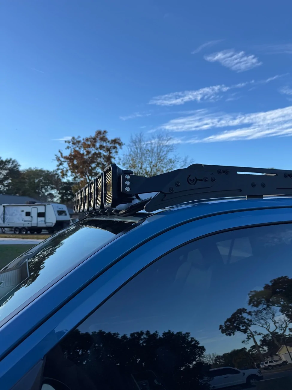 2025 4runner 6th gen Heritage Blue TRD Sport Premium, Prinsu Pro Roof Rack, Diode Dynamics SS5 Crosslink, SS3 Ditch Light Pods IMG_1600