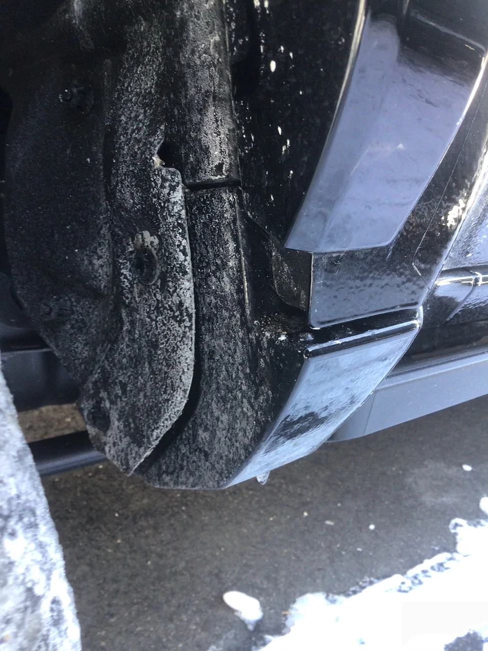 2025 4runner 6th gen Gap below rear door letting snow/mud inside — normal design or missing plug? IMG_2701