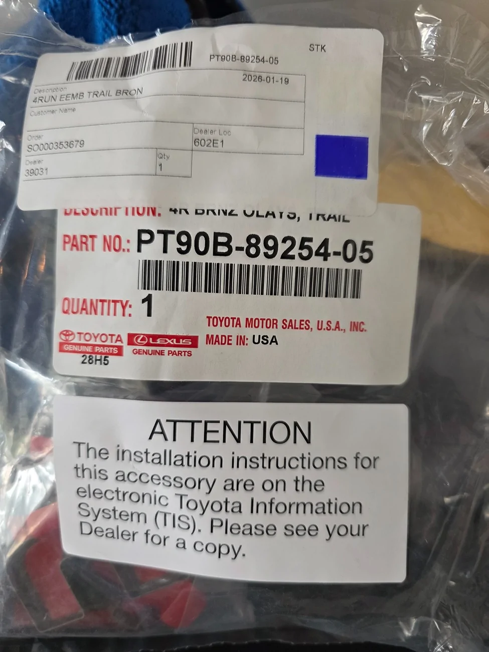 2025 4runner 6th gen OEM Trailhunter Bronze Badge Overlays - Partially Installed (on Hood and Lift Gate) 20260130_155512