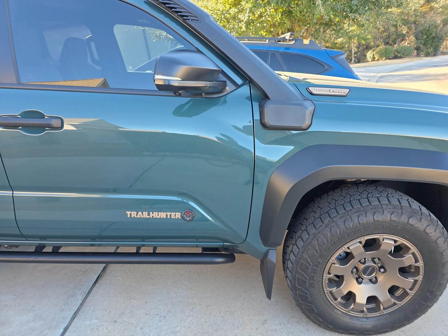 2025 4runner 6th gen OEM Trailhunter Bronze Badge Overlays - Partially Installed (on Hood and Lift Gate) 20260205_161143