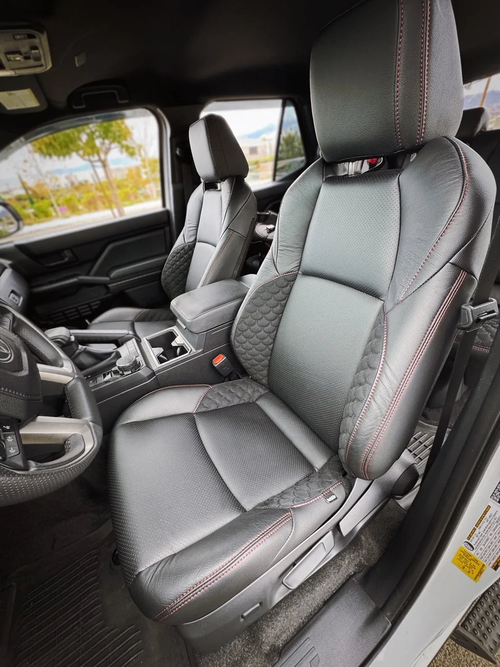 2025 4runner 6th gen Katzkin Leather Seats (Charcoal w/ Red Piping) installed in Supersonic Red 4Runner Interior