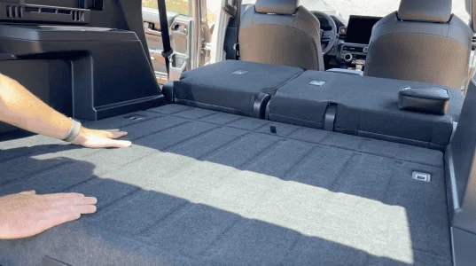 2025 4runner 6th gen Back feat folds flat in 2025 4Runner 6th Gen (Hybrid & Non-Hybrid) foldflat-2nd-row-seats-png