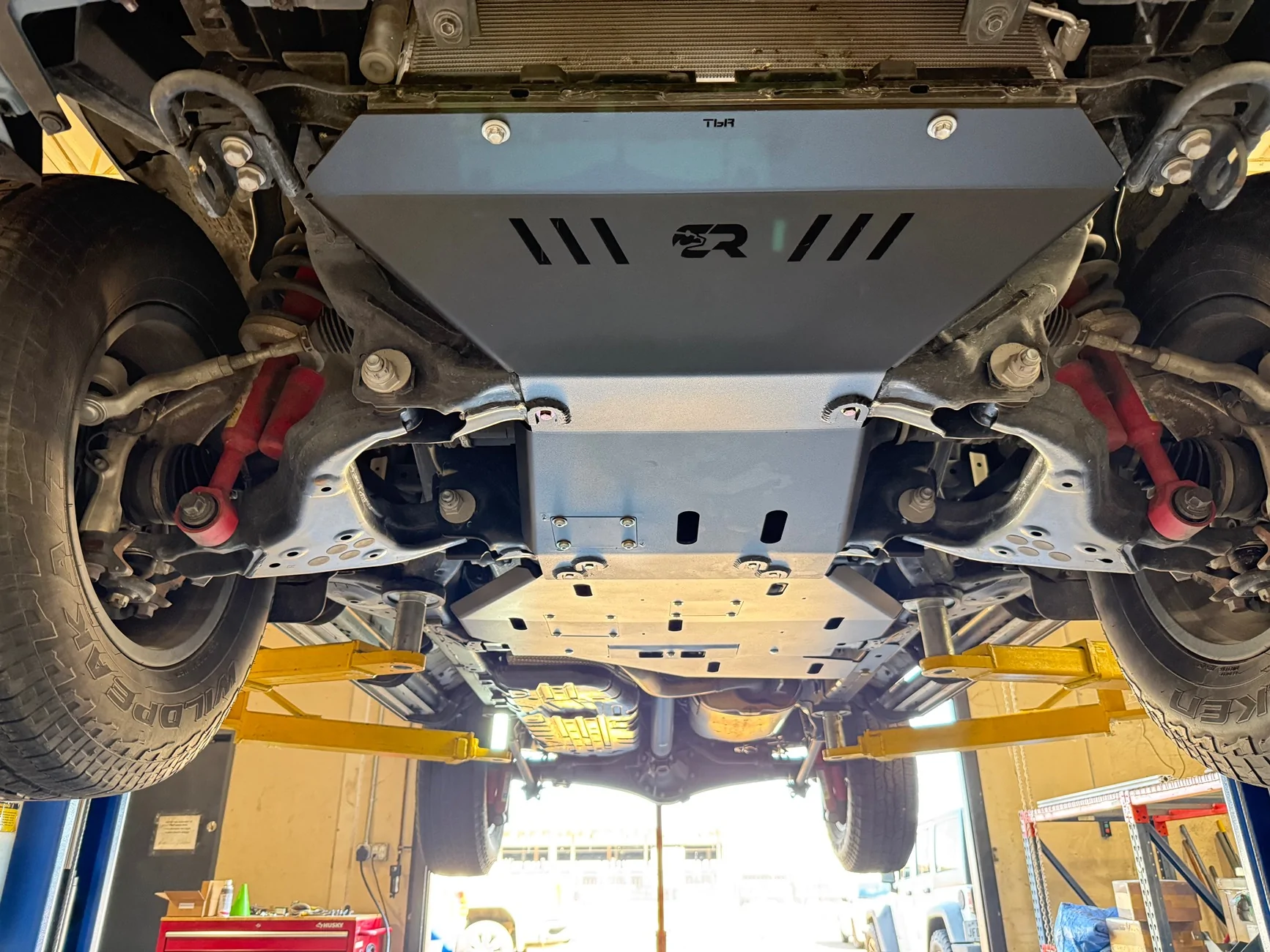 2025 4runner 6th gen Cali Raised Skid Plates, Rock Rails, Ditch Lights and Factory Tour IMG_4248