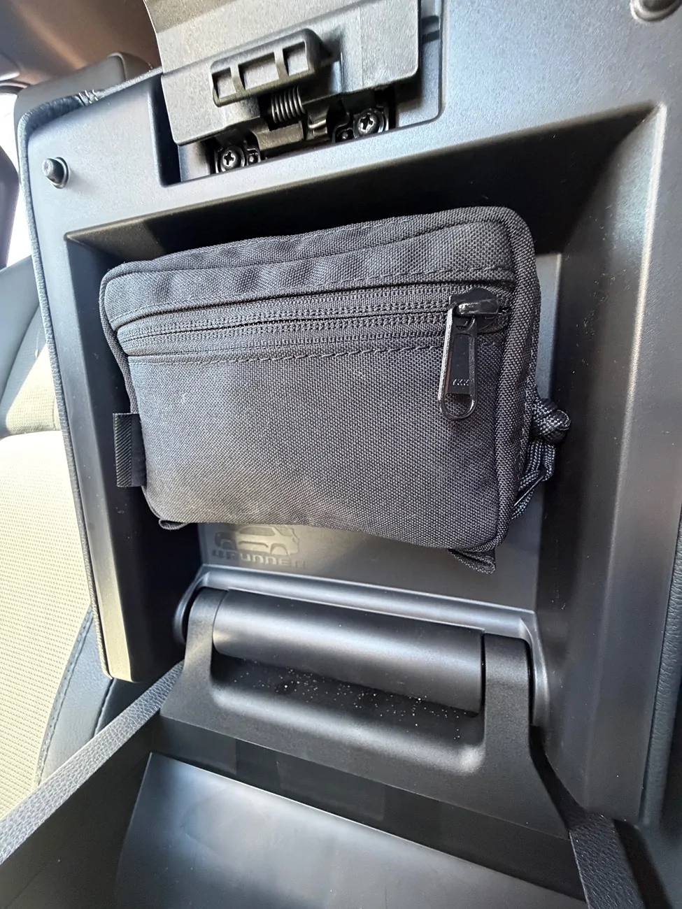2025 4runner 6th gen My Favorite Interior Mod: EDC Pouch attached to underside of center console arm rest IMG_0146