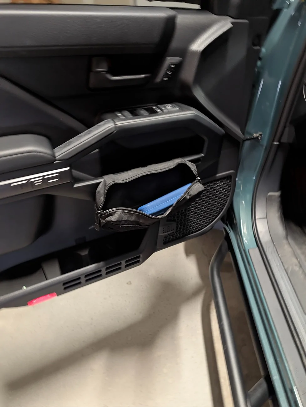 2025 4runner 6th gen Added Extra Front Driver/Passenger Storage (using existing molle panels on the front driver and passenger doors) PXL_20260401_171205195.RAW-01[1]