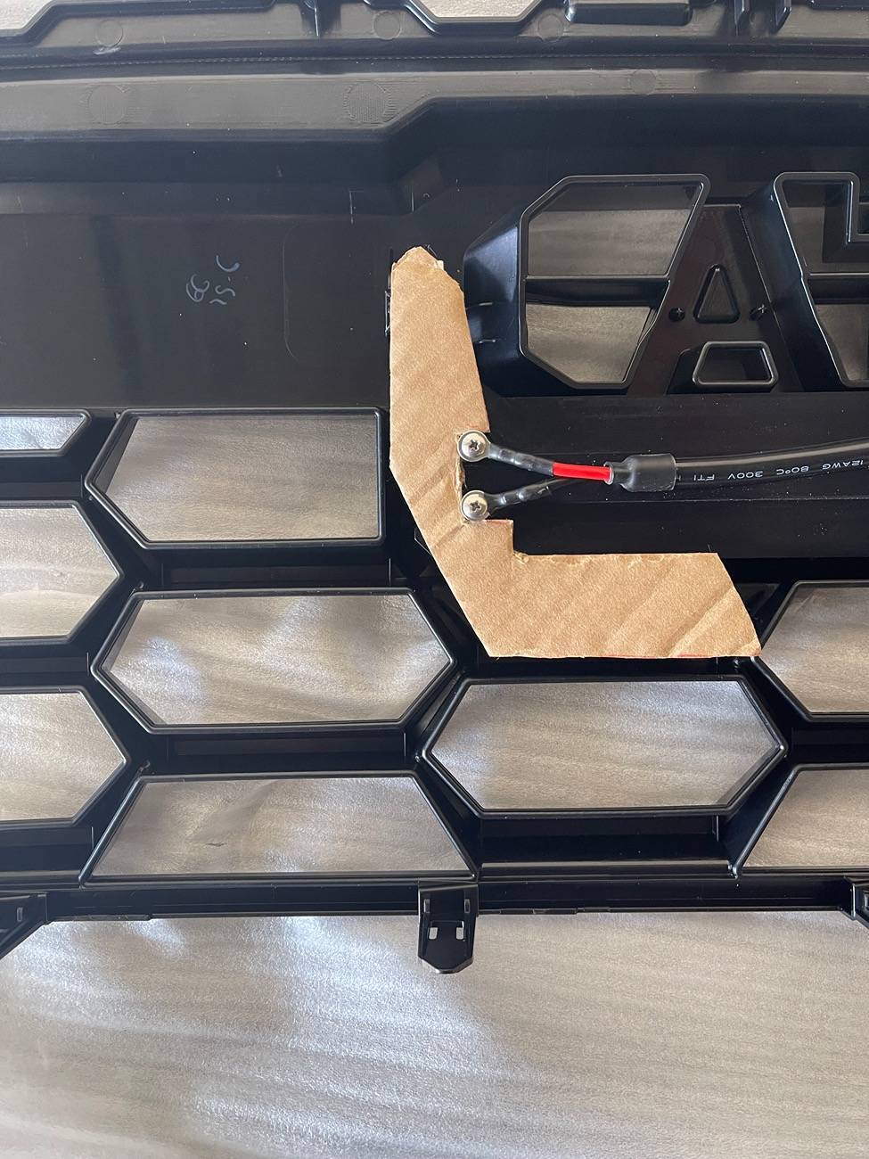 2025 4runner 6th gen Heretic light bar, Baja fog lights & Raptor aftermarket lights installed in TRD Pro grill img_5937-jpe