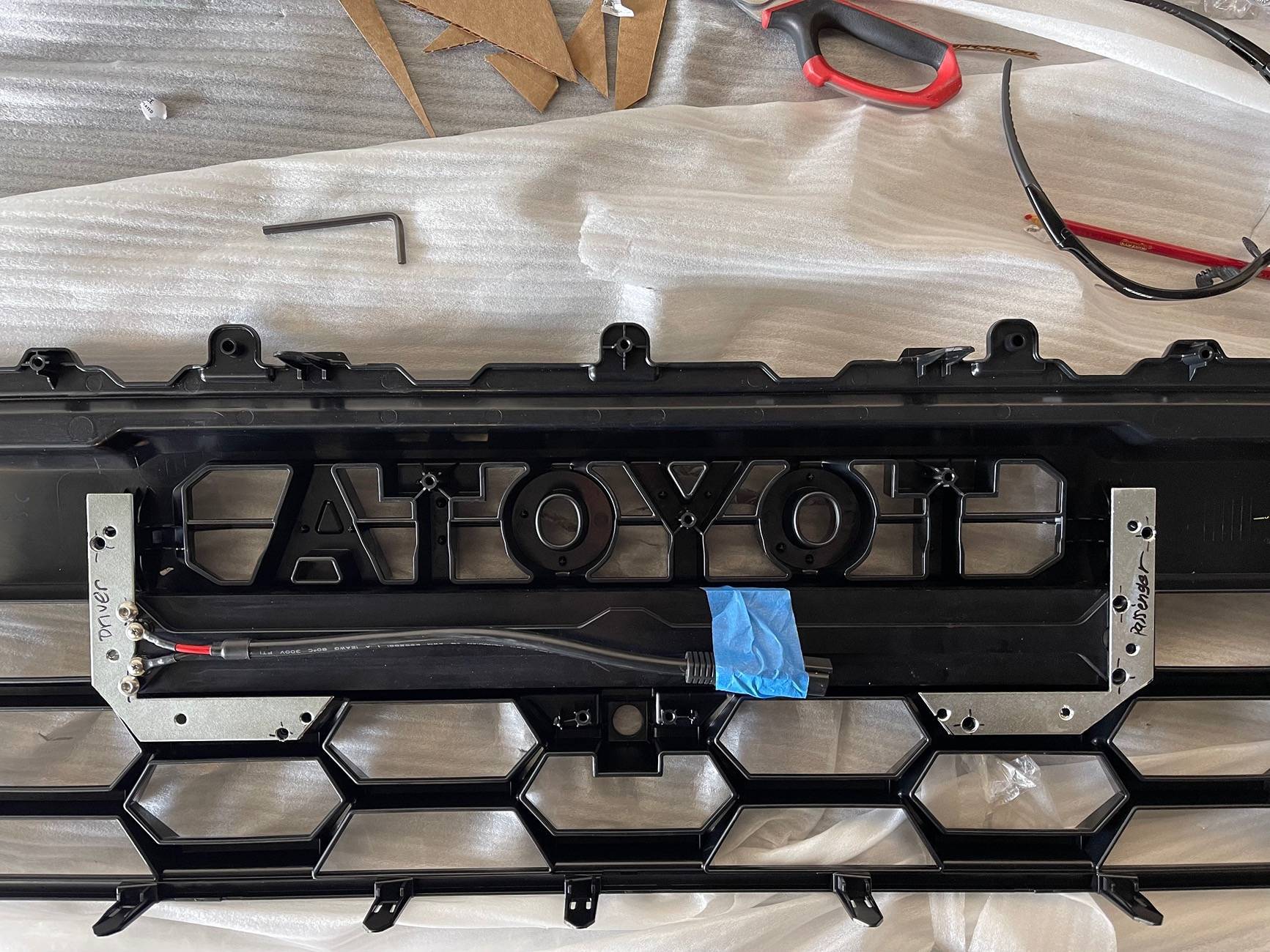 2025 4runner 6th gen Heretic light bar, Baja fog lights & Raptor aftermarket lights installed in TRD Pro grill img_5953-jpe