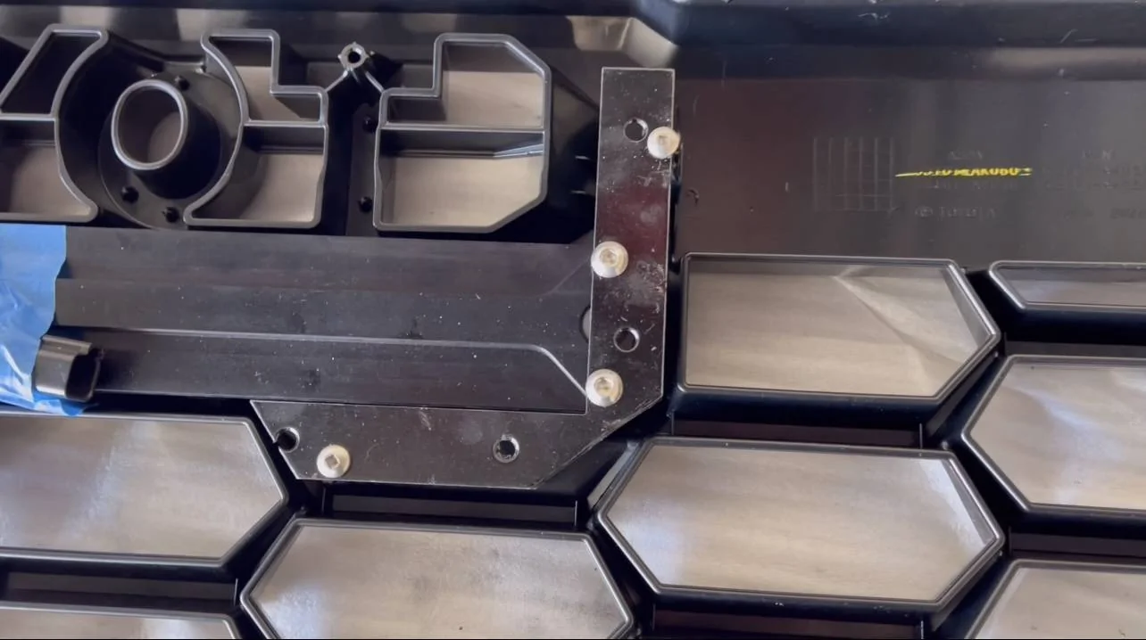 2025 4runner 6th gen Heretic light bar, Baja fog lights & Raptor aftermarket lights installed in TRD Pro grill img_6045-jpeg