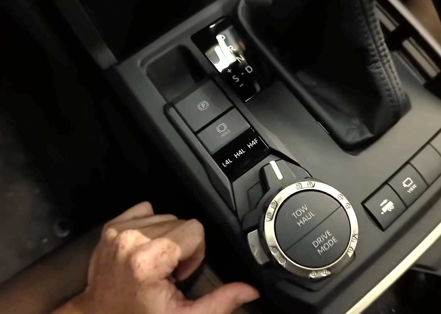 2025 4runner 6th gen 3rd Row Seats in 6th Gen 4Runner: Folded, Legroom, Headroom, Cargo Space -- in Limited Trim 2025 4Runner 6th Gen (Supersonic Red / Portobello) transmission control drive mode center console limited trim 2025 4runner 6th gen 1