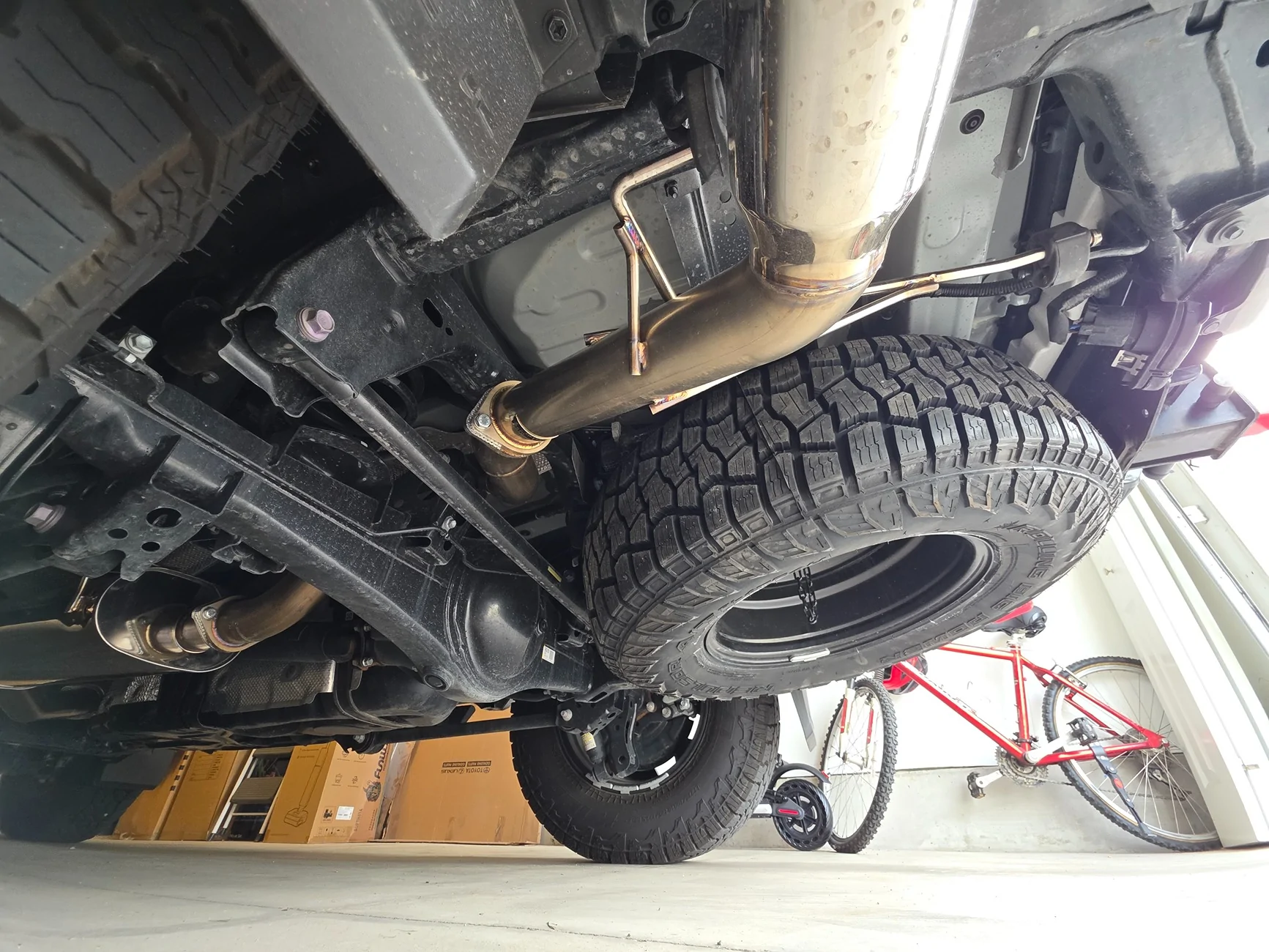2025 2026 4runner 6th gen Changed out spare tire to 33". Fits perfectly undercarriage! 20260918_162820