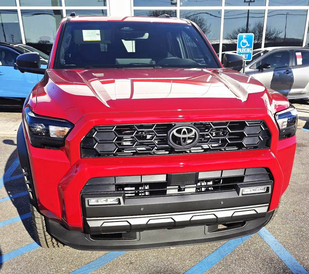 2025 4runner 6th gen Supersonic Red pops in the sun -- TRD Off-Road Premium w/ Black Softex Seats Supersonic Red TRD Off-Road PREMIUM 2025 4runner 6th gen exterior color 6