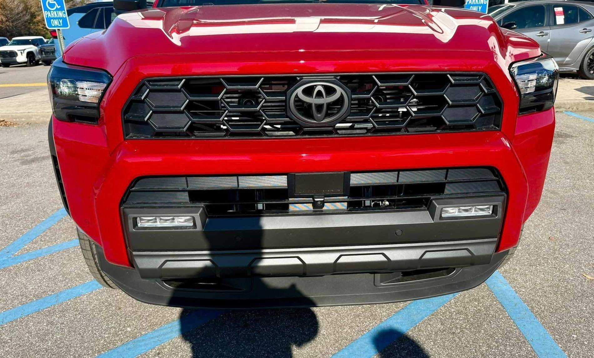 2025 4runner 6th gen Supersonic Red pops in the sun -- TRD Off-Road Premium w/ Black Softex Seats Supersonic Red TRD Off-Road PREMIUM 2025 4runner 6th gen exterior color 1