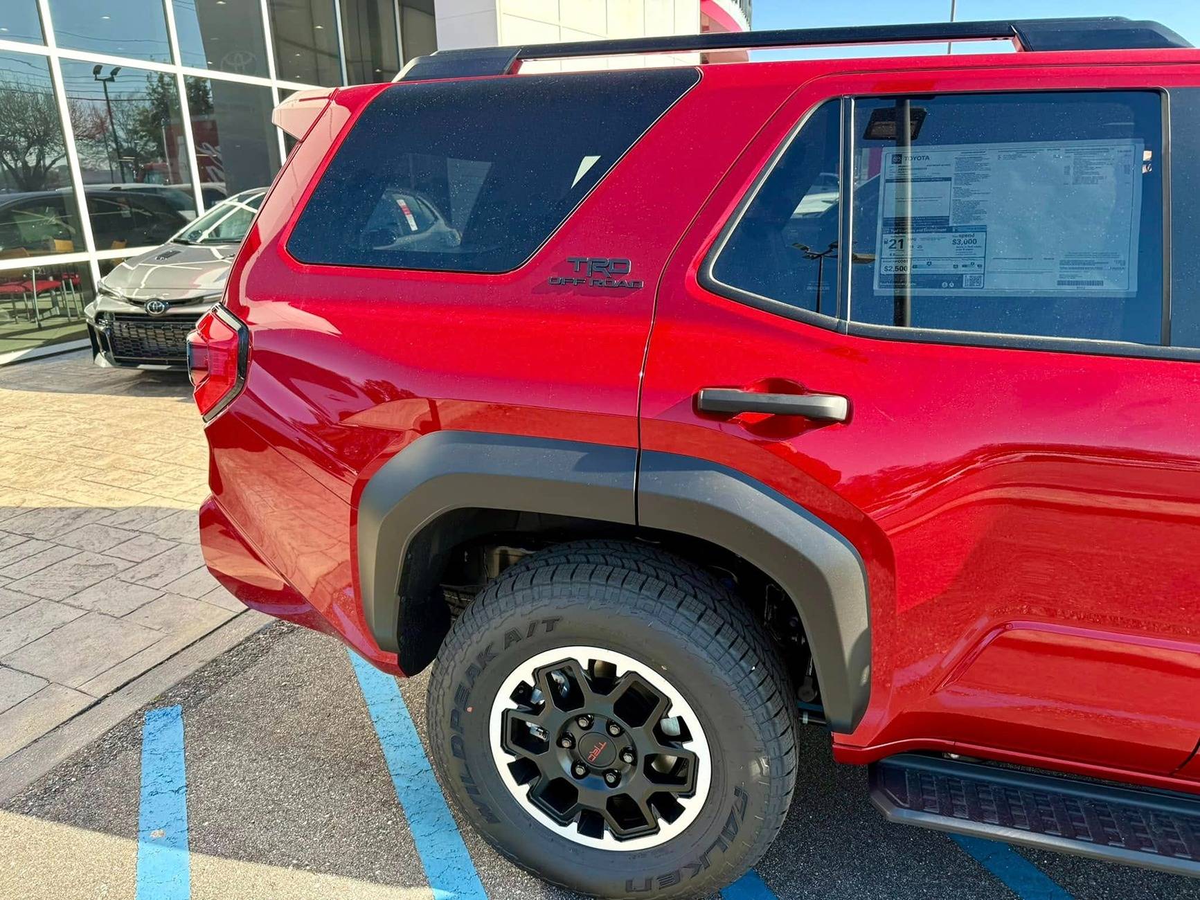 2025 4runner 6th gen Supersonic Red pops in the sun -- TRD Off-Road Premium w/ Black Softex Seats Supersonic Red TRD Off-Road PREMIUM 2025 4runner 6th gen exterior color 5