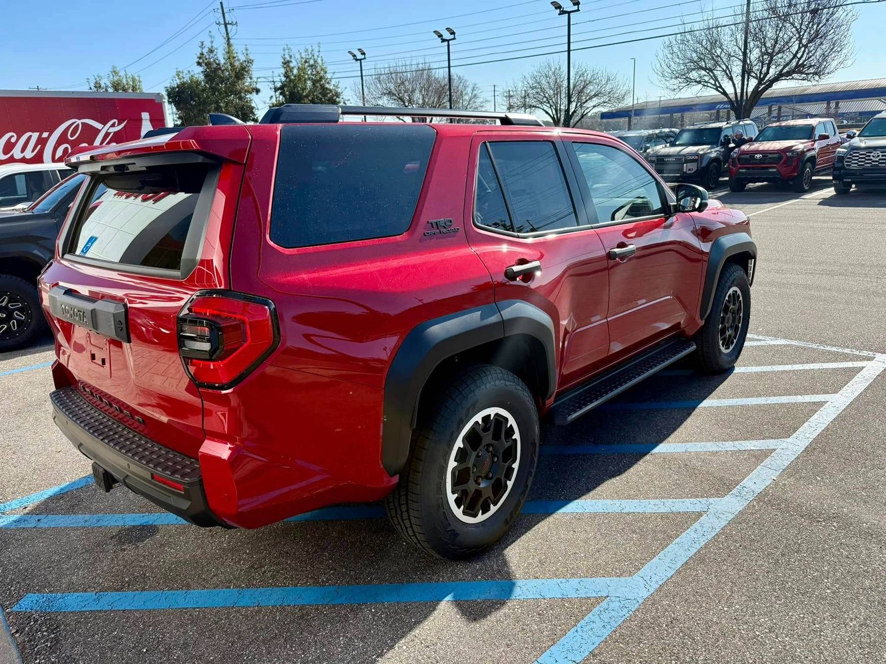 2025 4runner 6th gen Supersonic Red pops in the sun -- TRD Off-Road Premium w/ Black Softex Seats Supersonic Red TRD Off-Road PREMIUM 2025 4runner 6th gen exterior color 2