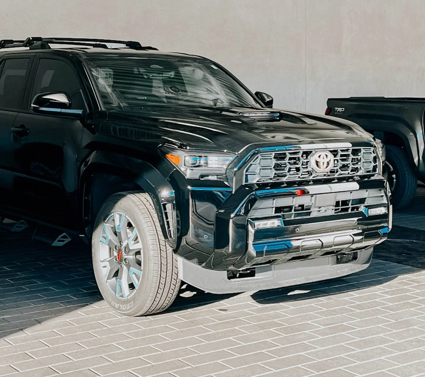 2025 4runner 6th gen BLACK Photos 4Runner 6th Gen (2025+) Bronze Badge Overlays & Badge Inserts look great on black 2025 4Runner 6th gen  1