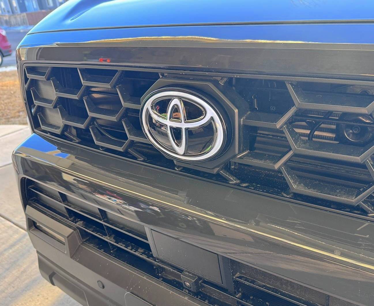2025 Toyota 4runner OEM Illuminated Front Emblem: Dark Chrome w/ Light Up LED installed [+ part number / price] IMG_7239 (1).JPG