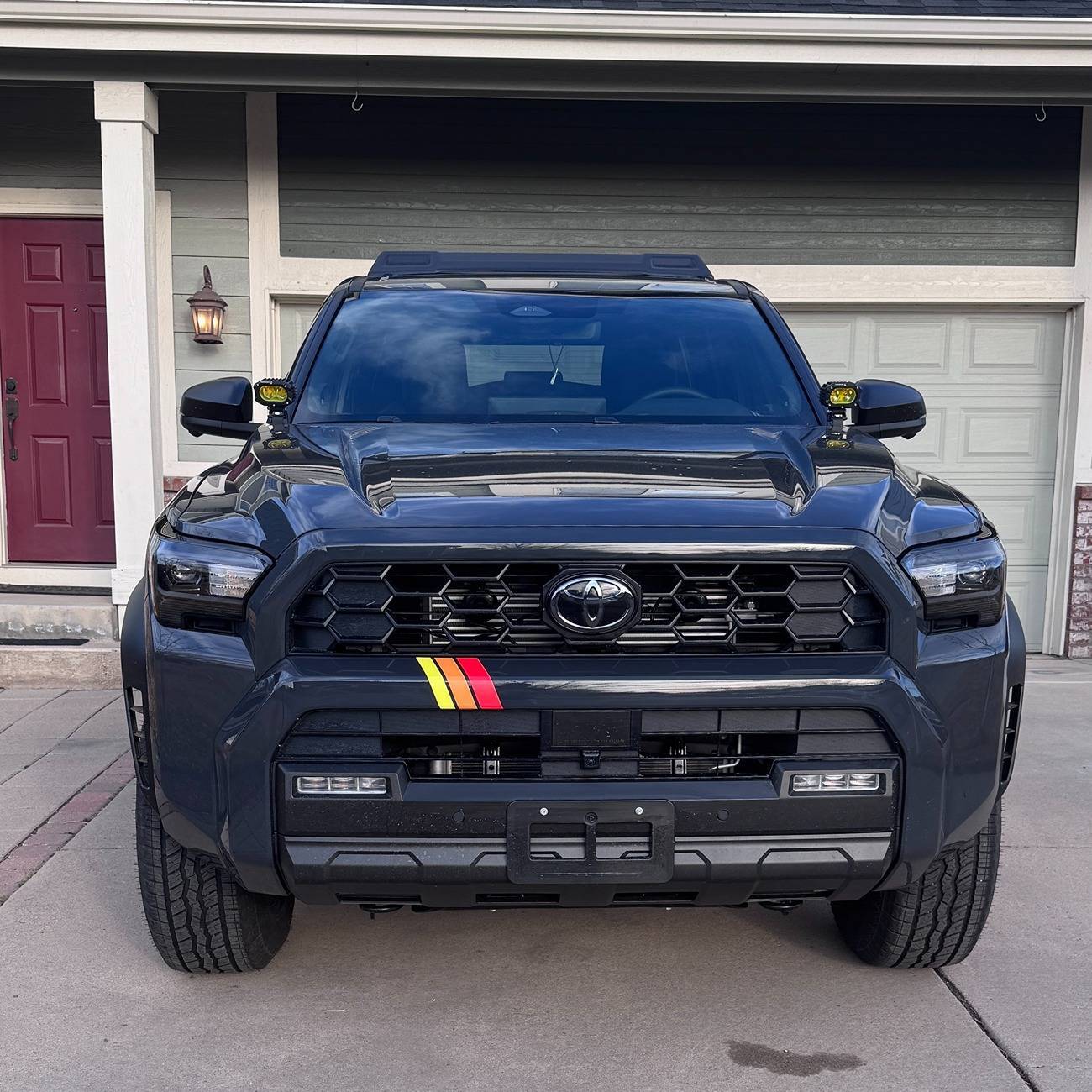 2025 4runner 6th gen Applied TRD Heritage Stripes on front bumper img_7340-