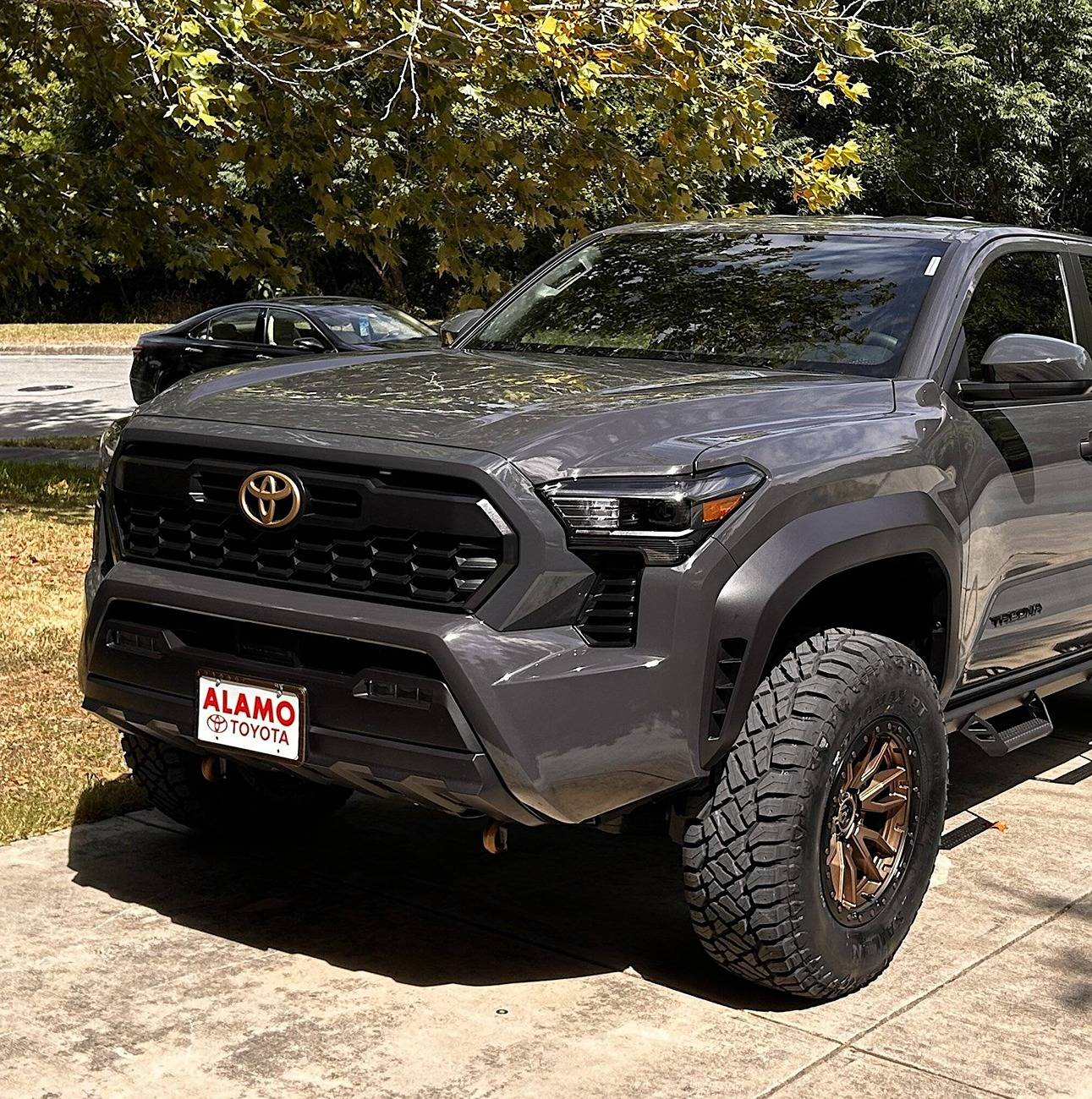 2025 4runner 6th gen Made some mockups in Photoshop to help decide which wheels to get. bronze badge overlay and bronze wheels on underground color
