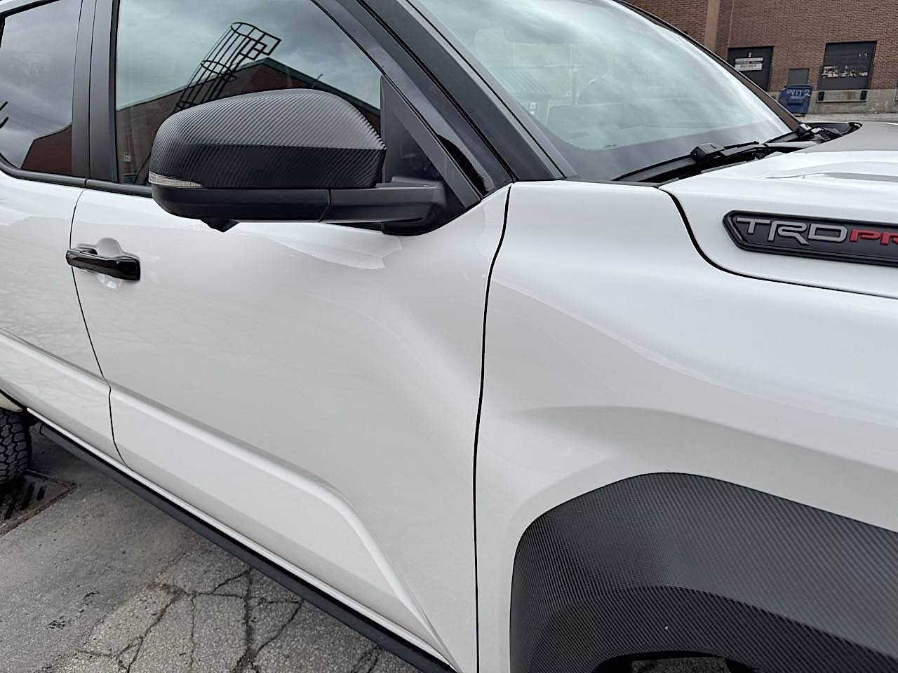 2025 4runner 6th gen 3M carbon fiber vinyl wrap install on fender flares & side mirrors IMG_3452 Large (1)