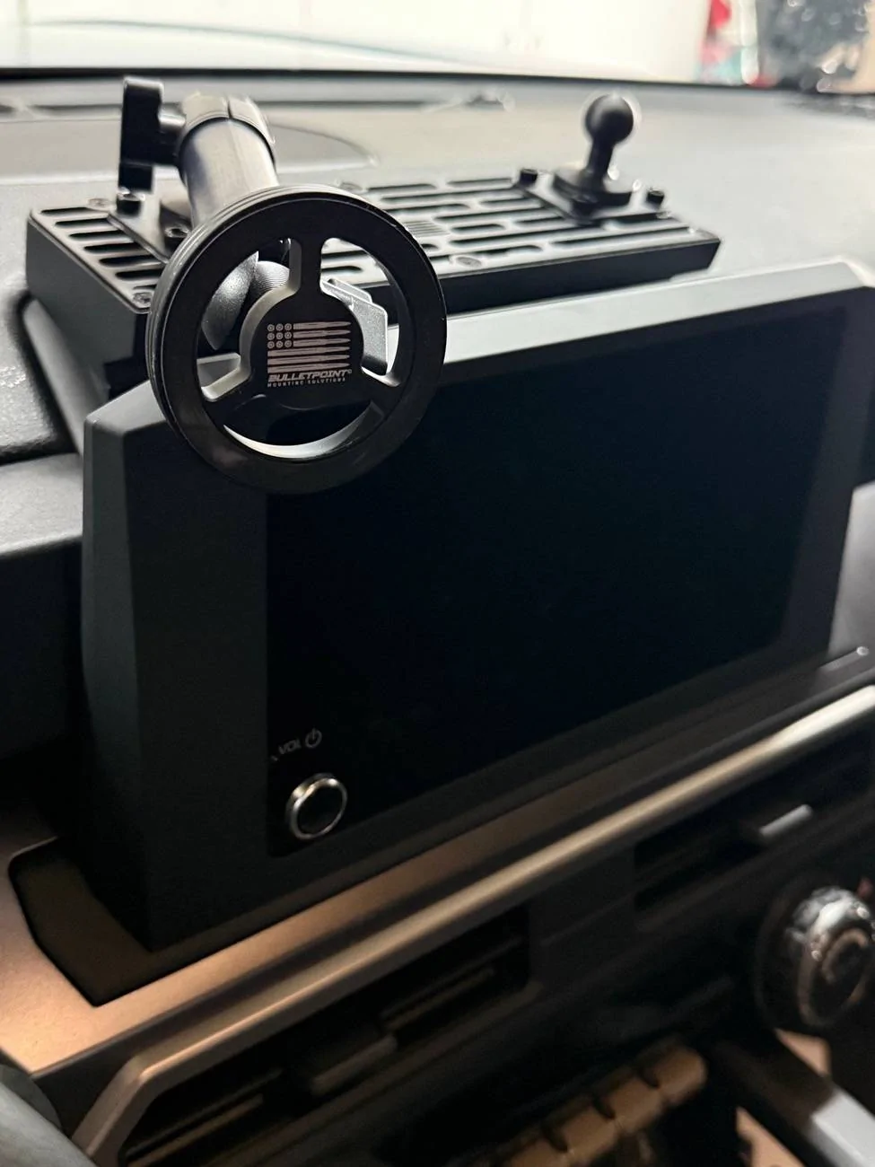 2025 4runner 6th gen Has anyone modded the wireless charger with a Magsafe yet? IMG_7716