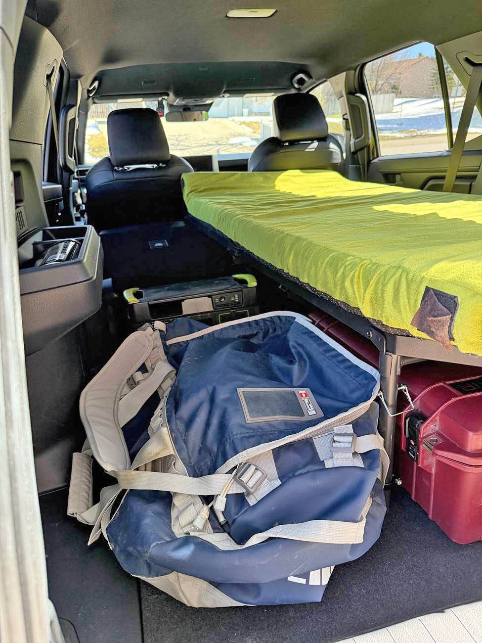 2025 4runner 6th gen Camping / sleeping bed in cargo area with Nokhu Gear Pack Rack platform & mattress IMG_2266