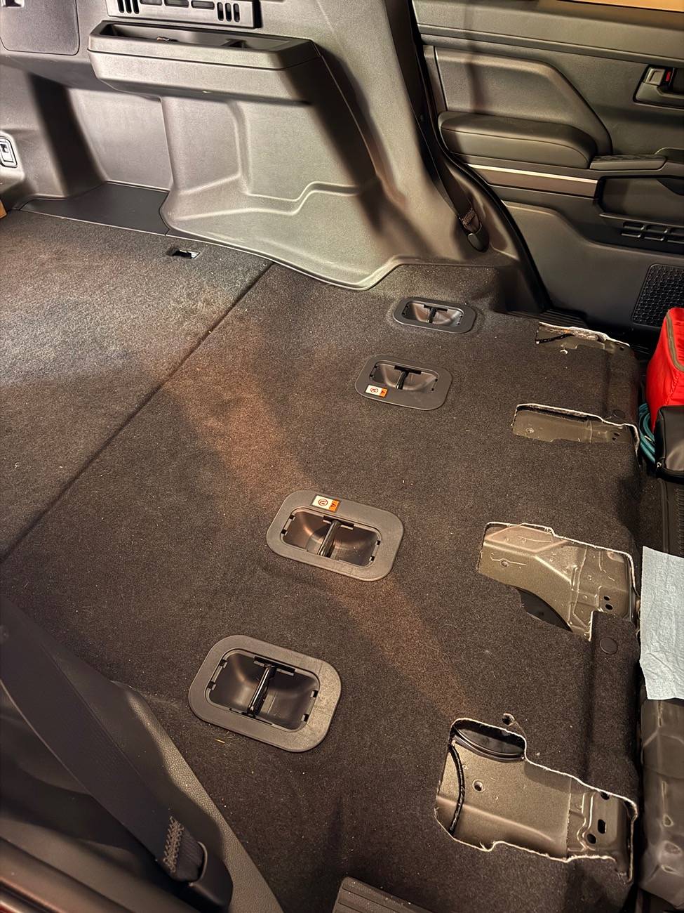 2025 4runner 6th gen Second Row Seat Removal - how to remove plastic shrouds covering mounting flange? IMG_7938